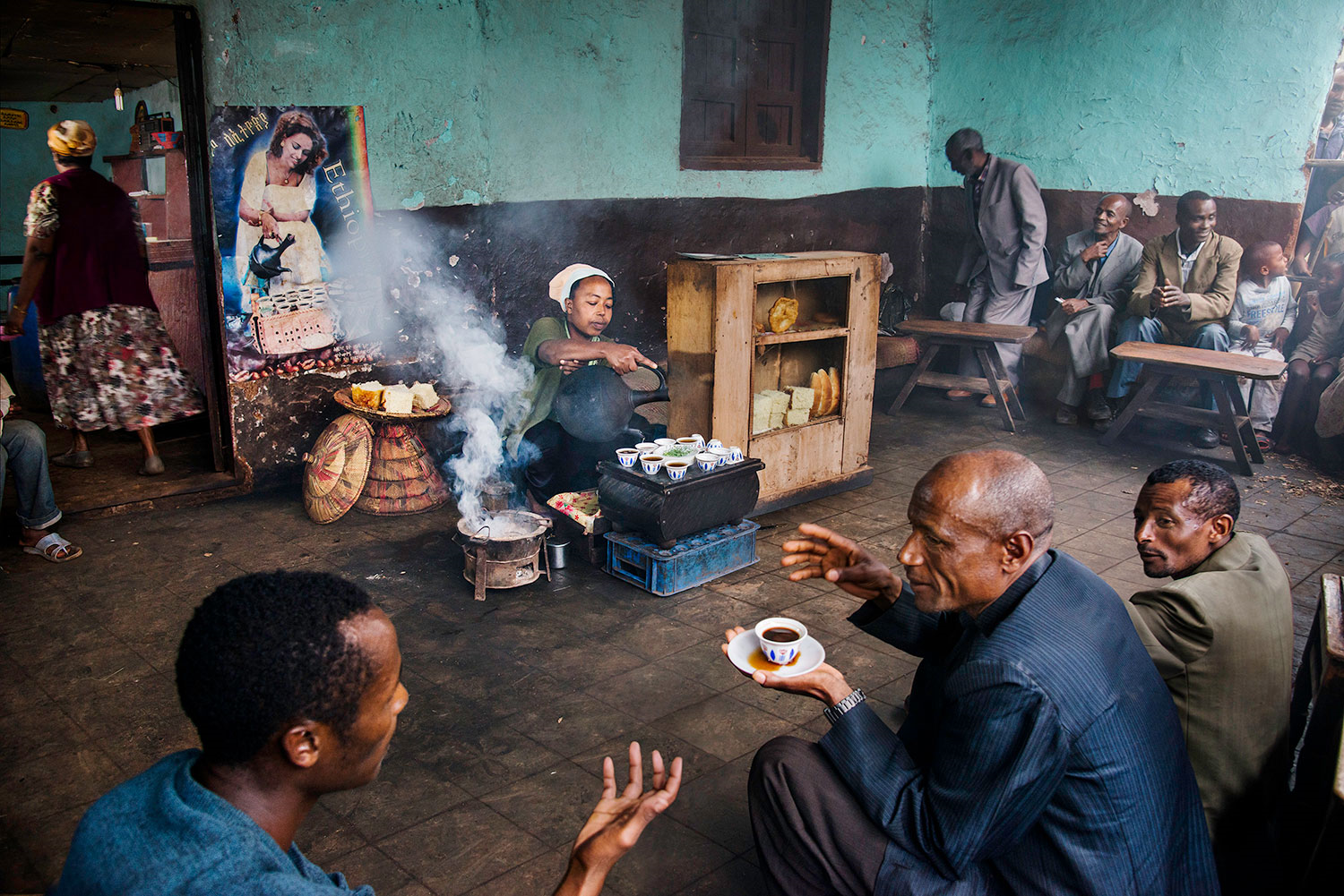 A woman prepares for a coffee ritual, Amaro region, Ethiopia, 2014. All photographs by Steve McCurry
