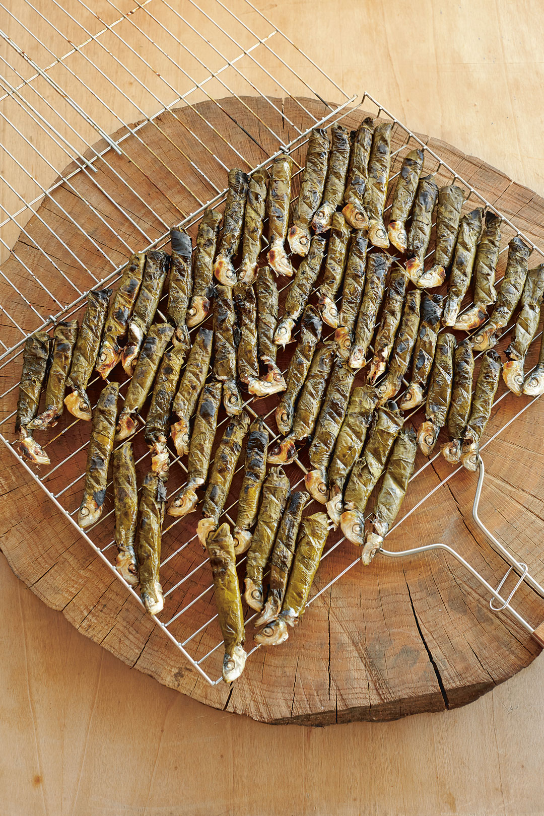 Sardines grilled in vine leaves, from The Turkish Cookbook