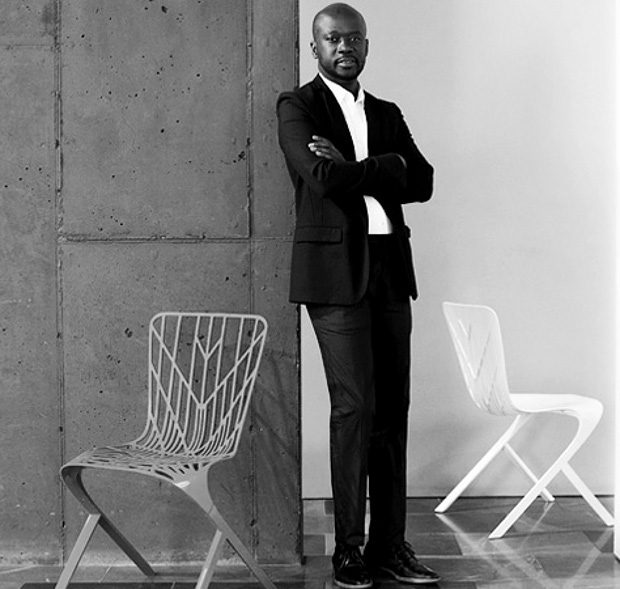 David Adjaye beside his Skeleton chair from his Washington collection for Knoll