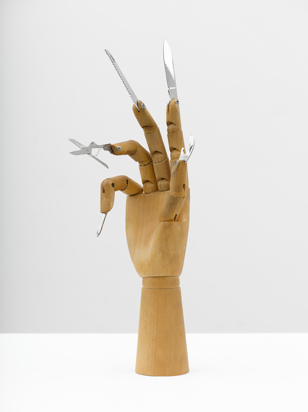 Damián Ortega - The Part played by Labour in the Transition from Ape to Man. “Darin Anteil der Arbeit an der Menschwerdung des Affen” (F. Engel) 2013 Wooden hand model and steel knives - Photo: Ben Westoby Courtesy Freud Museum London White Cube