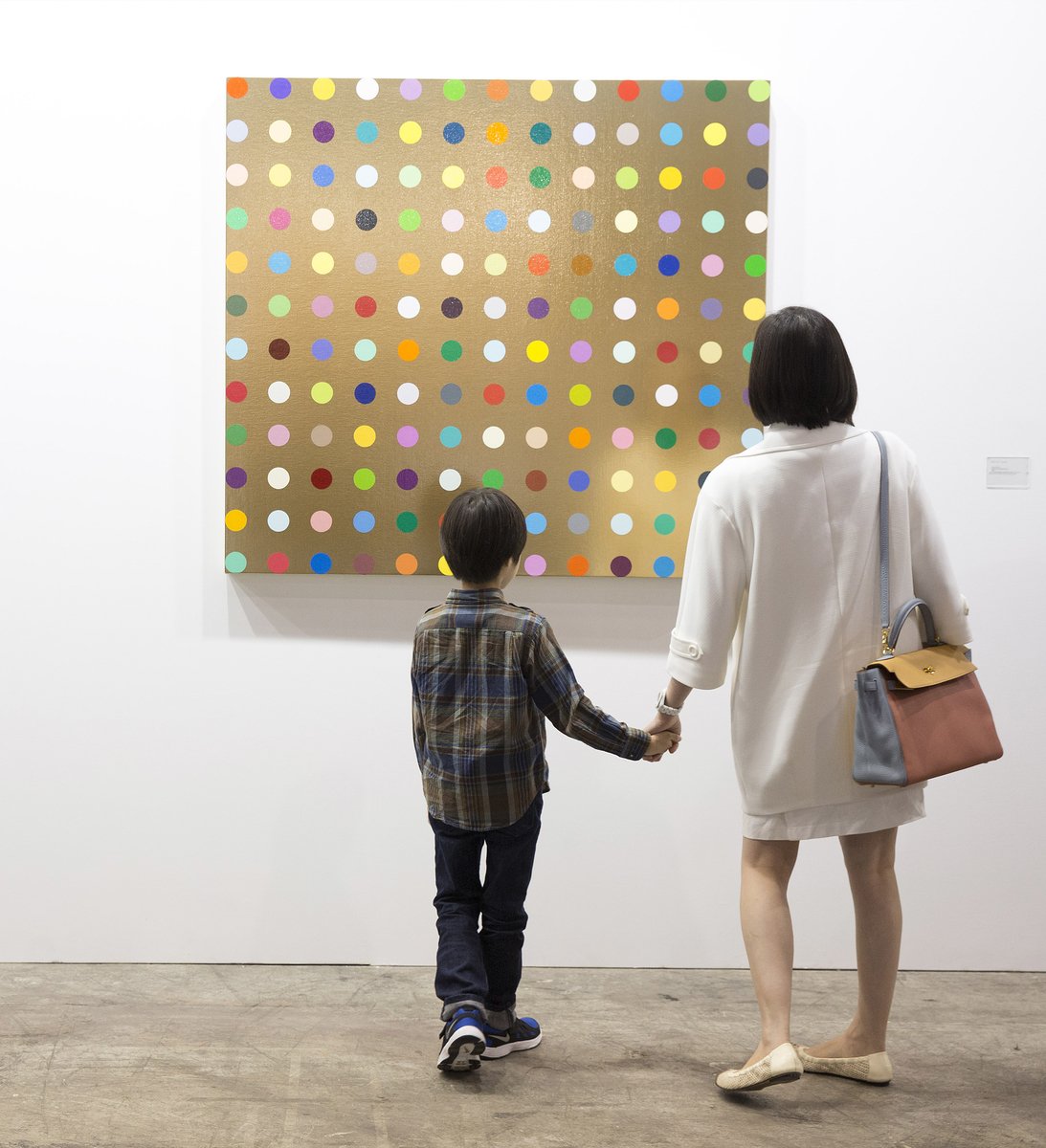 White Cube's booth at the fair this year, with a Damien Hirst spot painting