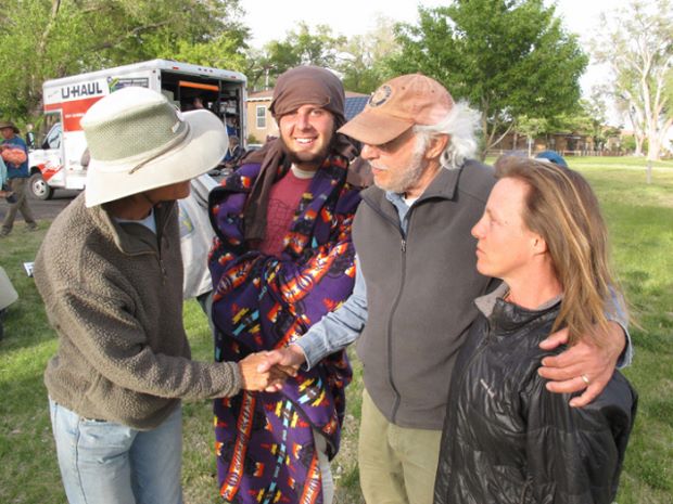 Danny Lyon (brown cap, second from right) greets Climate Marchers to Albuquerque, summer 2014.