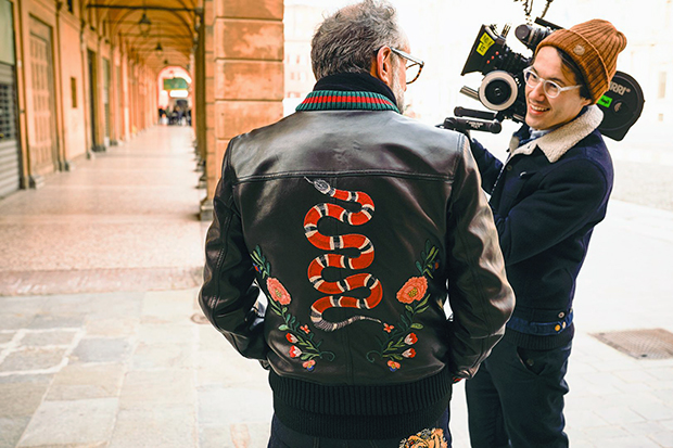 Massimo Bottura in a Gucci DIY leather bomber with snake appliqué. Image courtesy of British GQ, gq-magazine.co.uk