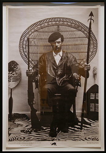 Huey Newton in a Peacock Chair. Photography attributed to Blair Stapp, composition by Eldridge Cleaver