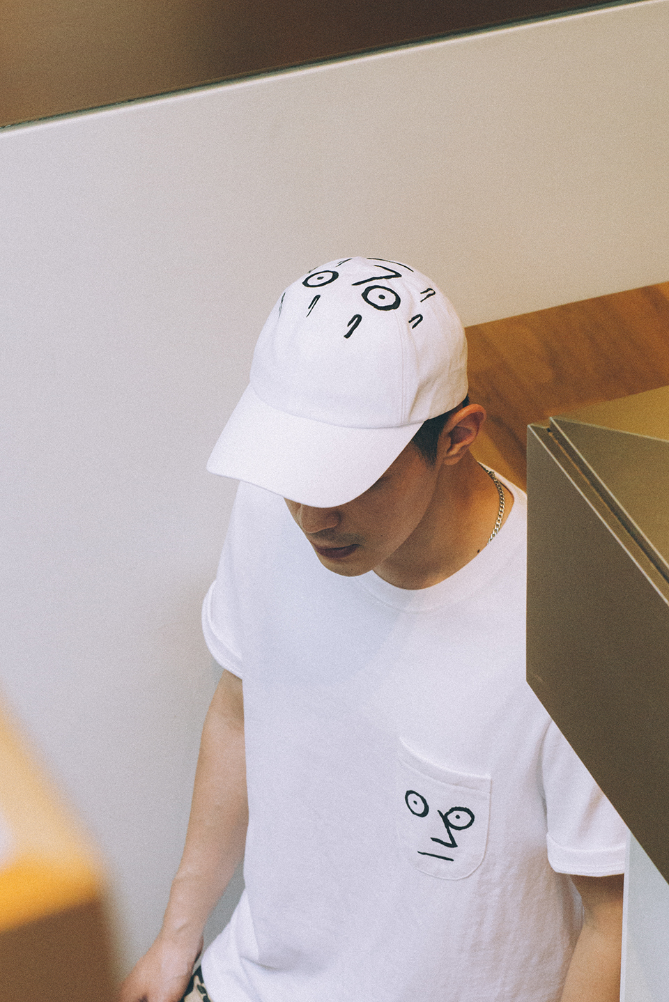 A cap and t-shirt from NouNou's new line
