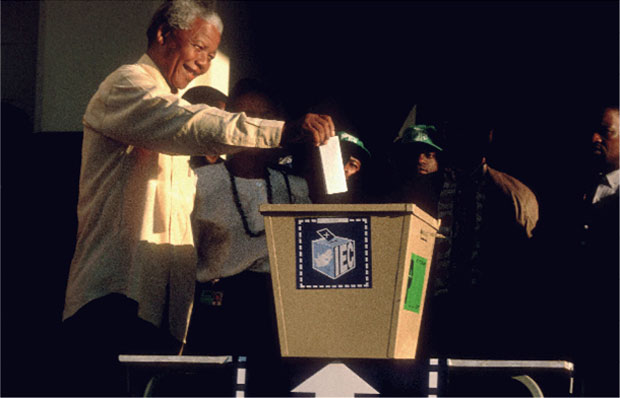 Nelson Mandela casts his vote in South Africa's first multiracial election, April 1994