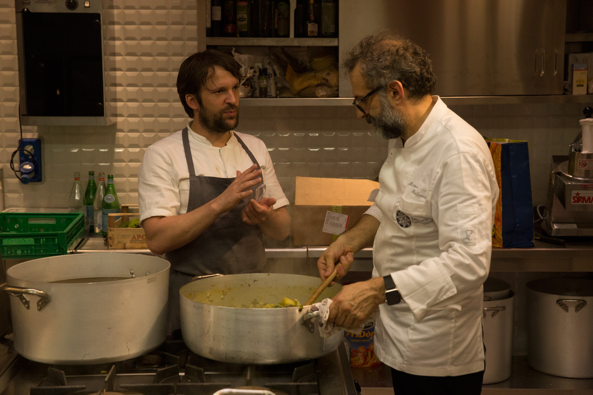 René Redzepi and Massimo Bottura at Refettorio Ambrosiano, as reproduced in Bread is Gold. Photo by Emanuele Colombo
