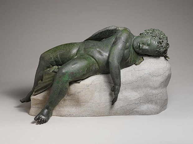 Statue of Eros Sleeping c. 3rd Century BC – early 1st Century AD, bronze, Metropolitan Museum of Art, New York. Michelangelo’s marble Sleeping Eros sculpture, 1496, now lost, would have taken inspiration from this Hellenistic tradition
