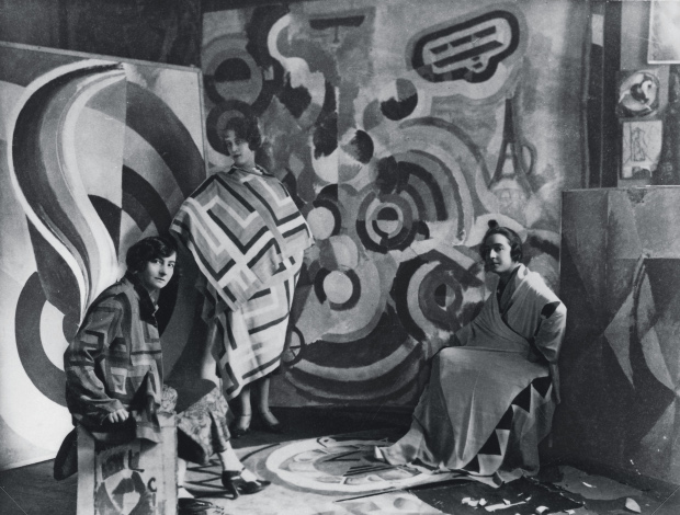  Sonia Delaunay (right) and two friends in Robert Delaunay’s studio, rue des Grands-Augustins, Paris 1924. Image courtesy of Bibliothèque nationale de France, Paris	