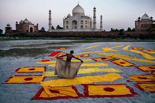 Man dries fabric near the Taj Mahal - Steve McCurry from the book India