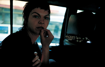Valérie in the taxi, Paris, 2001 by Nan Goldin. Our of our limited-edition prints.