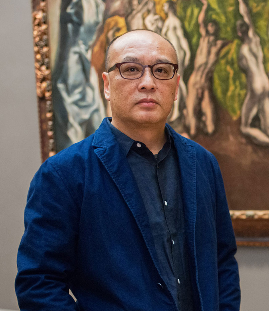 Zhang Xiaogang beside The Vision of Saint John (c. 1609–14) by El Greco, as featured in The Artist Project