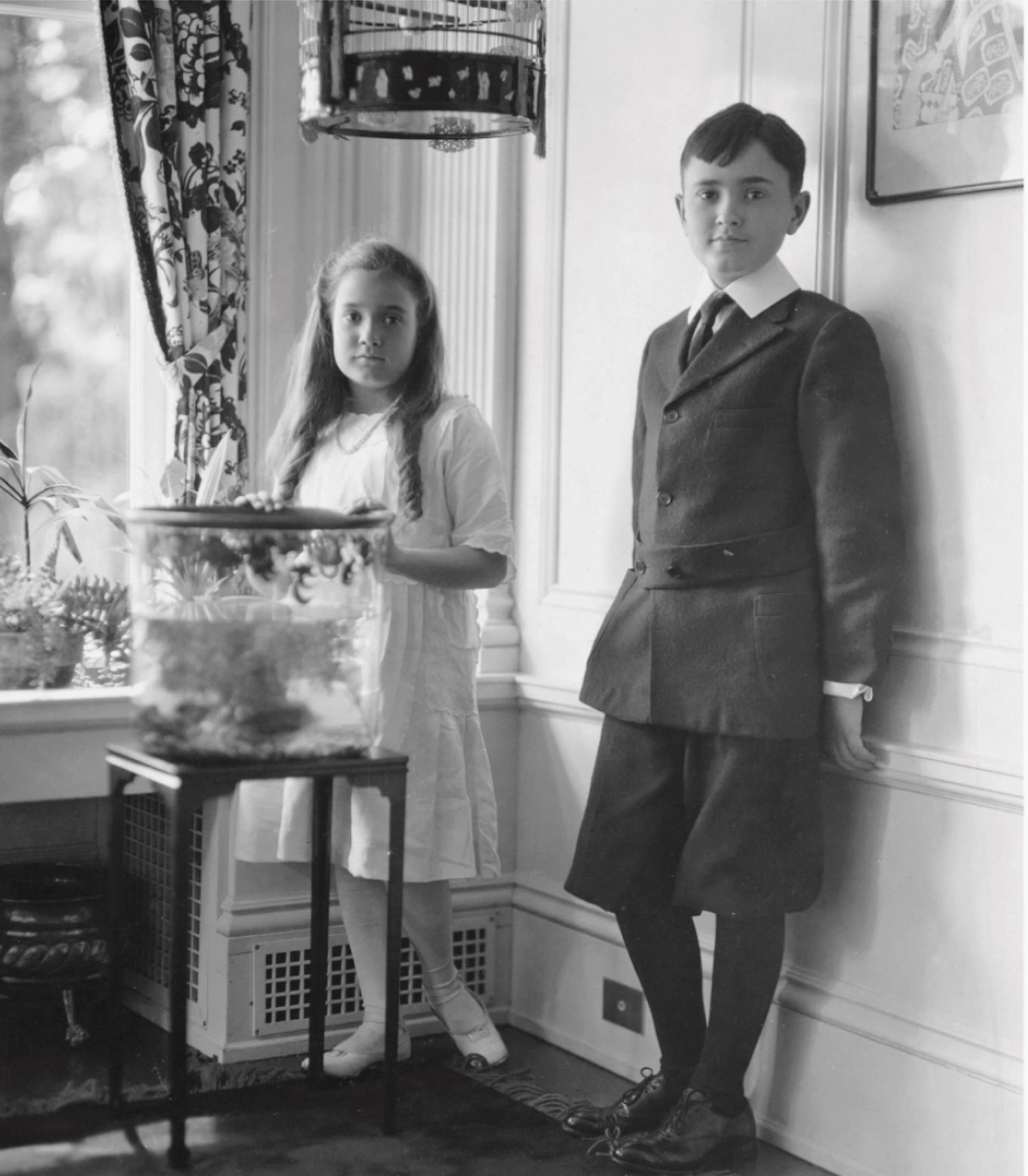 Portrait of Philip and his sister, Theodate, likely in their childhood home, New London, Ohio, as reproduced in Philip Johnson: A Visual Biography