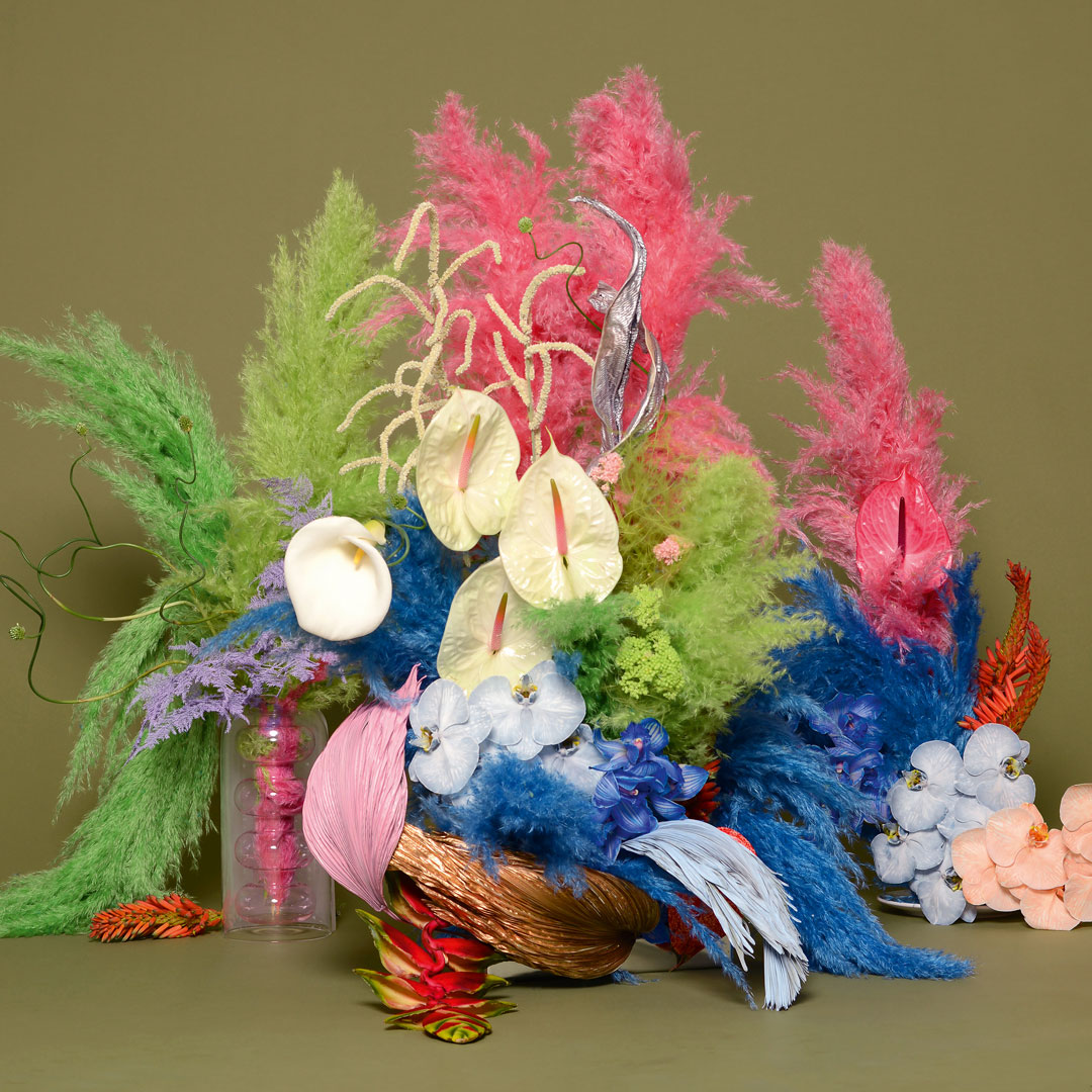 BRRCH (Brittany Asch, New York): palm leaves, calla lily, pampas grass, anthuriums, kalanchoe, lobster claws, amaranth, allium and orchids. Courtesy or BRRCH 