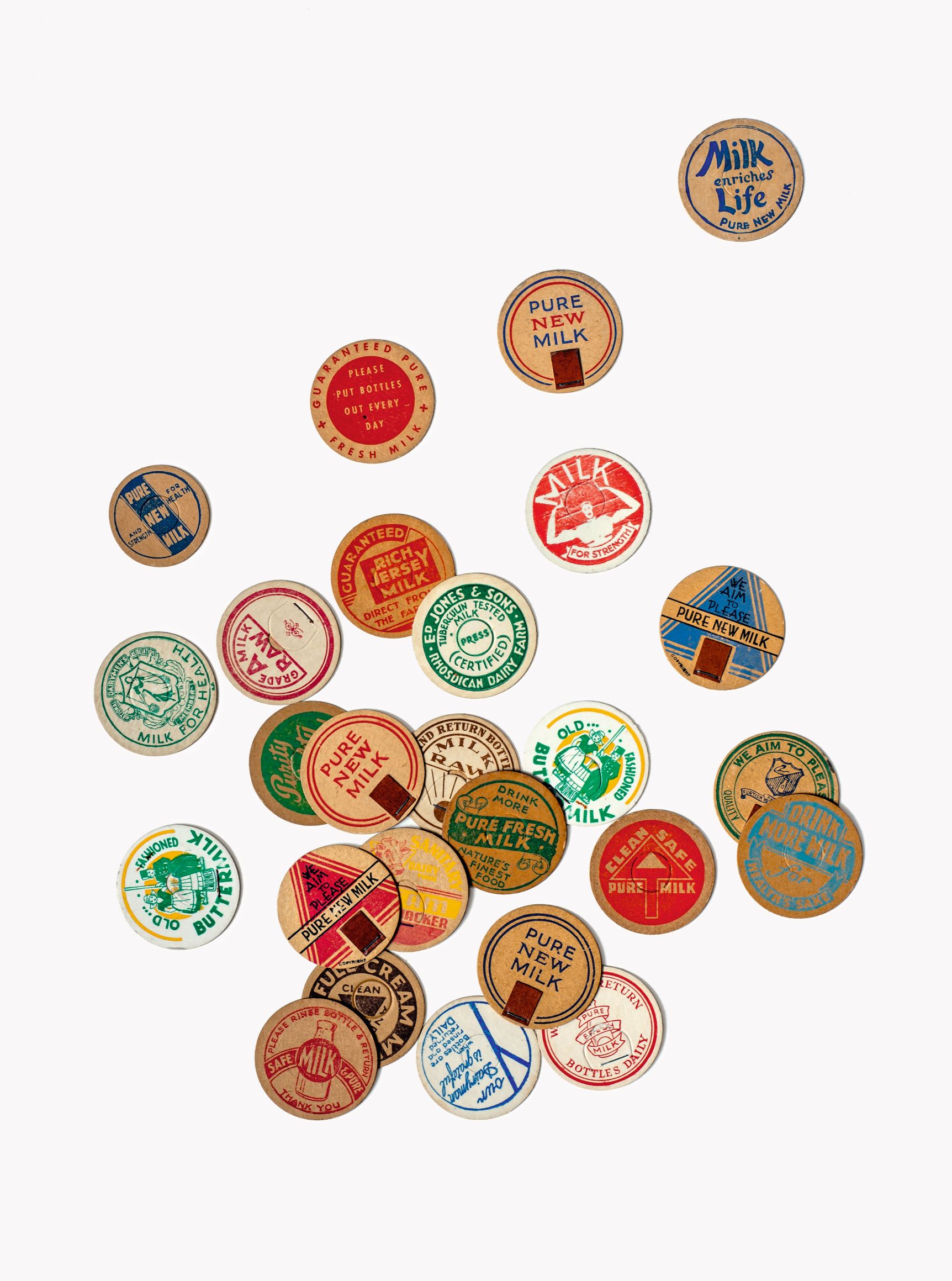 Milk-bottle Tops (England, 1950s), 1½ in. (3.8 cm) diameter, photograph by Flora Fricker, collection of Annie Atkins 