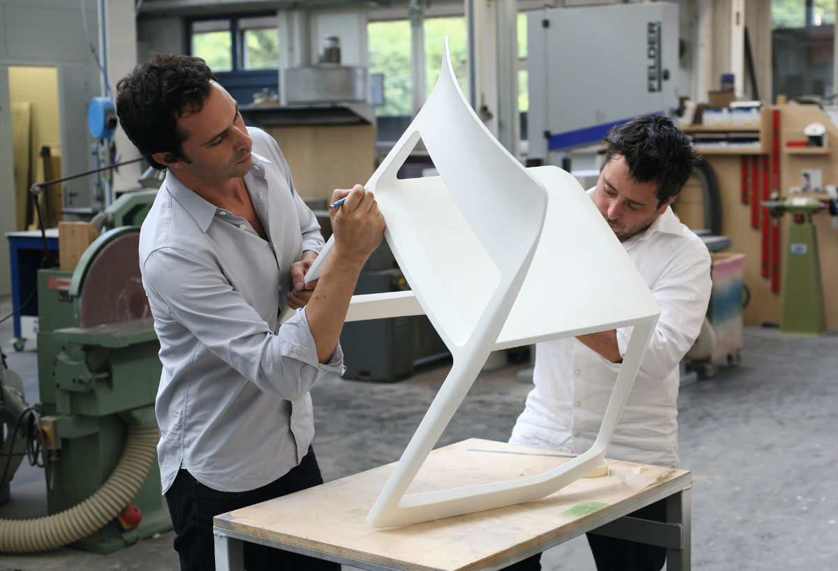 Barber and Osgerby working on their earlier Tip Ton chair for Vitra. As reproduced in our new book