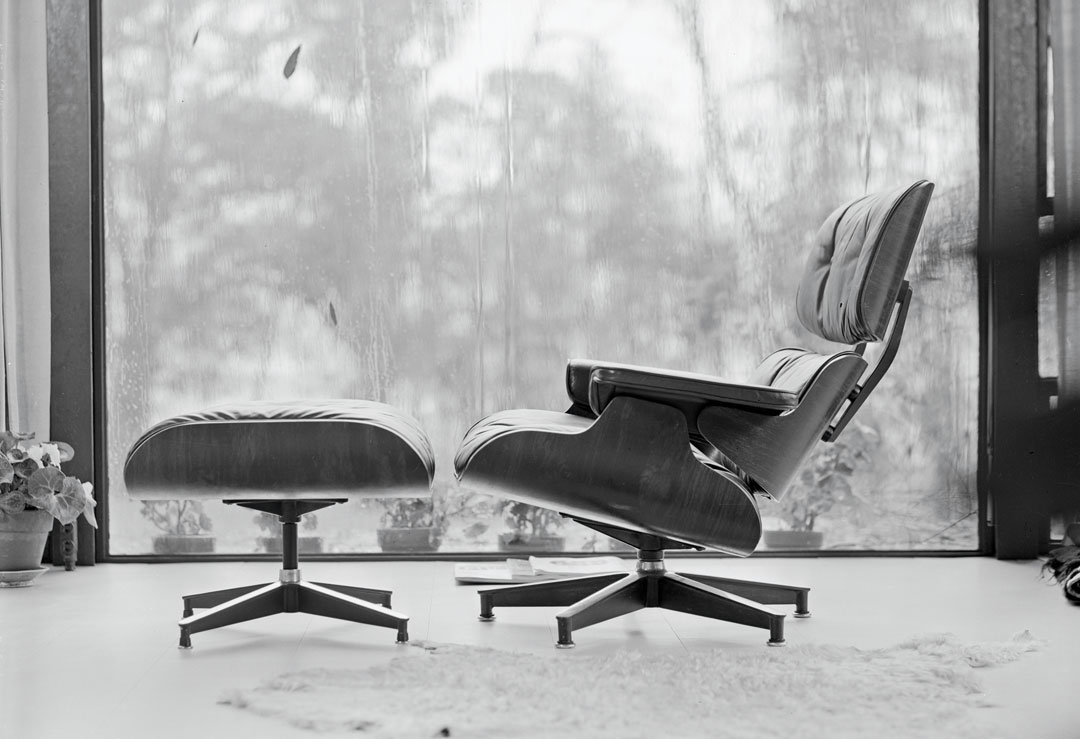 670 chair and 671 ottoman within the Eames House, photographed by Charles and Ray Eames, c. 1956. As reproduced in our new Herman Miller book