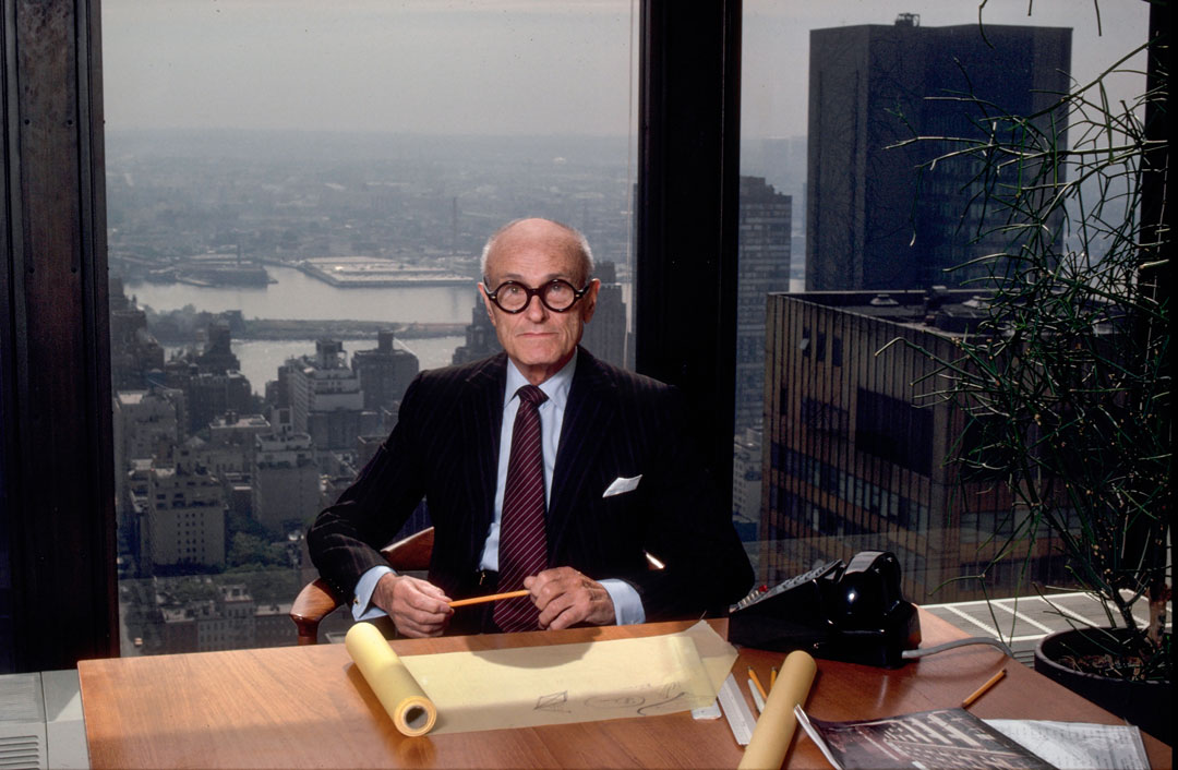 Portrait of Philip at his desk in his New York office in the Seagram Building, 1982.