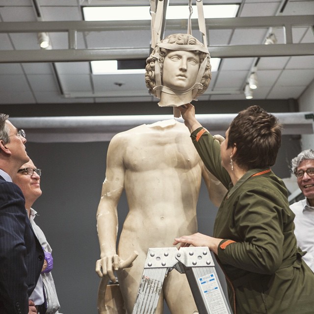 The Metropolitan Museum's Carolyn Riccardelli,  Lawrence Becker, and Michael Morris re-attach the head of Tullio Lombardo's Adam, observed by director Thomas Campbell. Photograph by Chris Heins of the Met’s Photo Studio. Image courtesy of @metobjectsconservation Instagram
