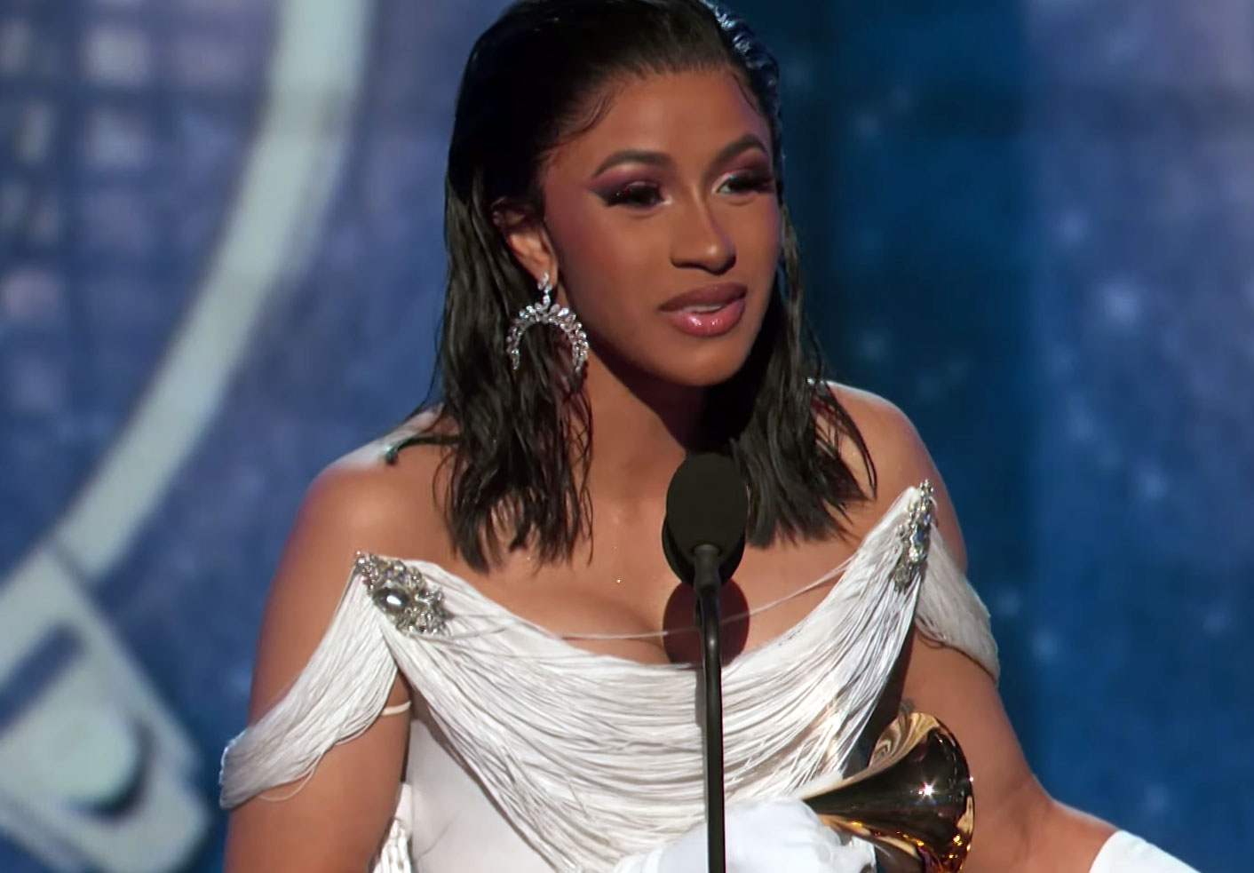 Cardi B accepts her award at the 2019 Grammys