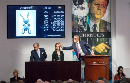Bids being taken for Rabbit (1986) by Jeff Koons, at Christie's last night. The piece went for $91,075,000, setting a new record for a work by a living artist sold at auction. Image courtesy of Christie's