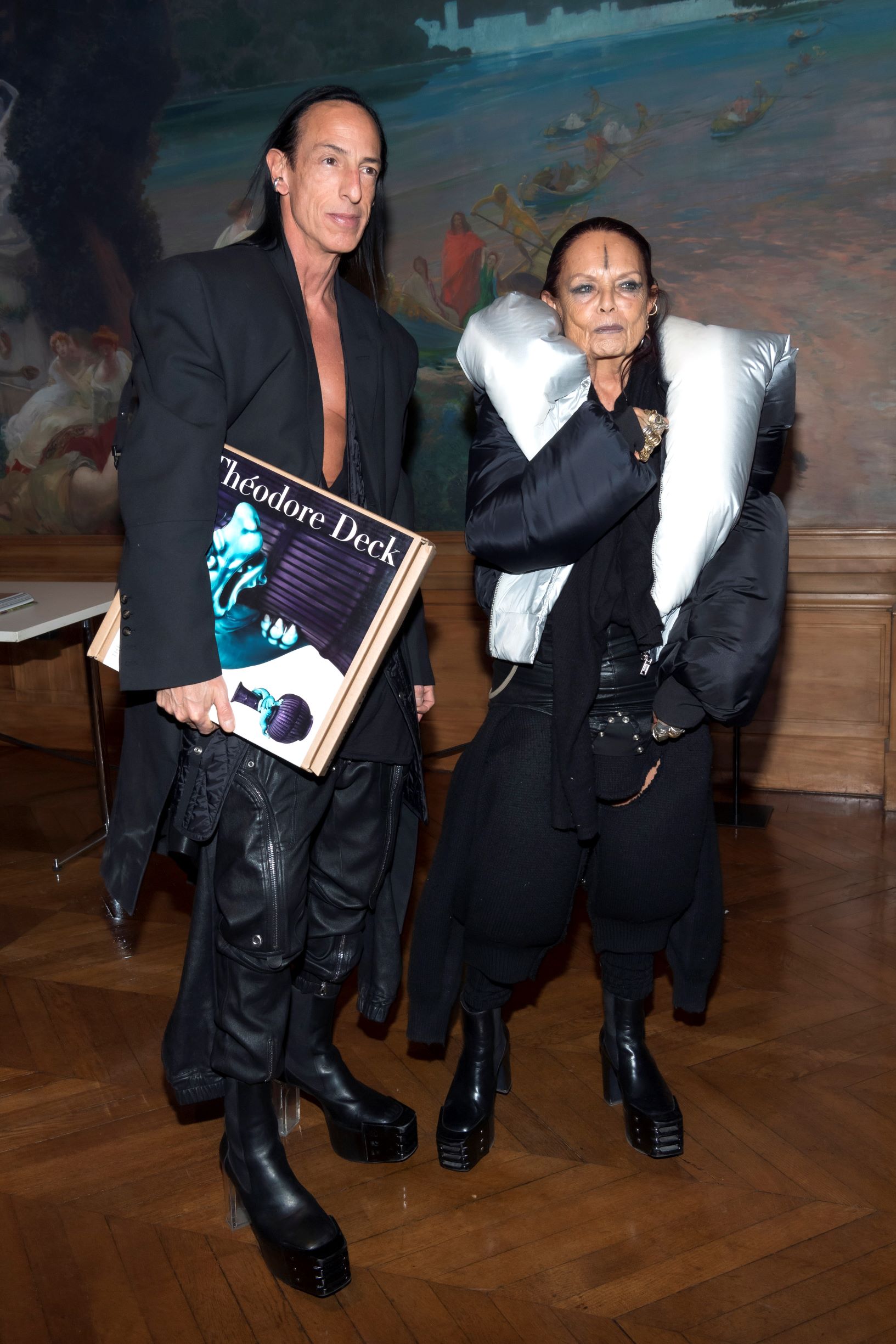 Rick Owens and Michèle Lamy at the Musée des Arts Décoratifs in Paris for Peter Marino's Théodore Deck book signing. Owens carries a copy of Théodore Deck. Photographs by Luc Castel