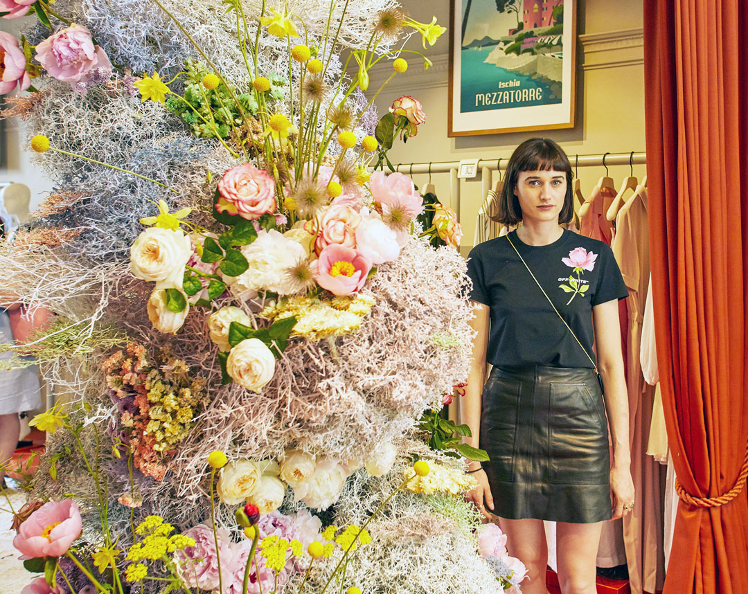 Emma Weaver of Palais Flowers with her display at 5 Carlos Place
