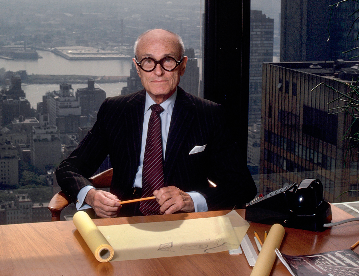 Philip Johnson at his desk in his New York office in the Seagram Building, 1982
