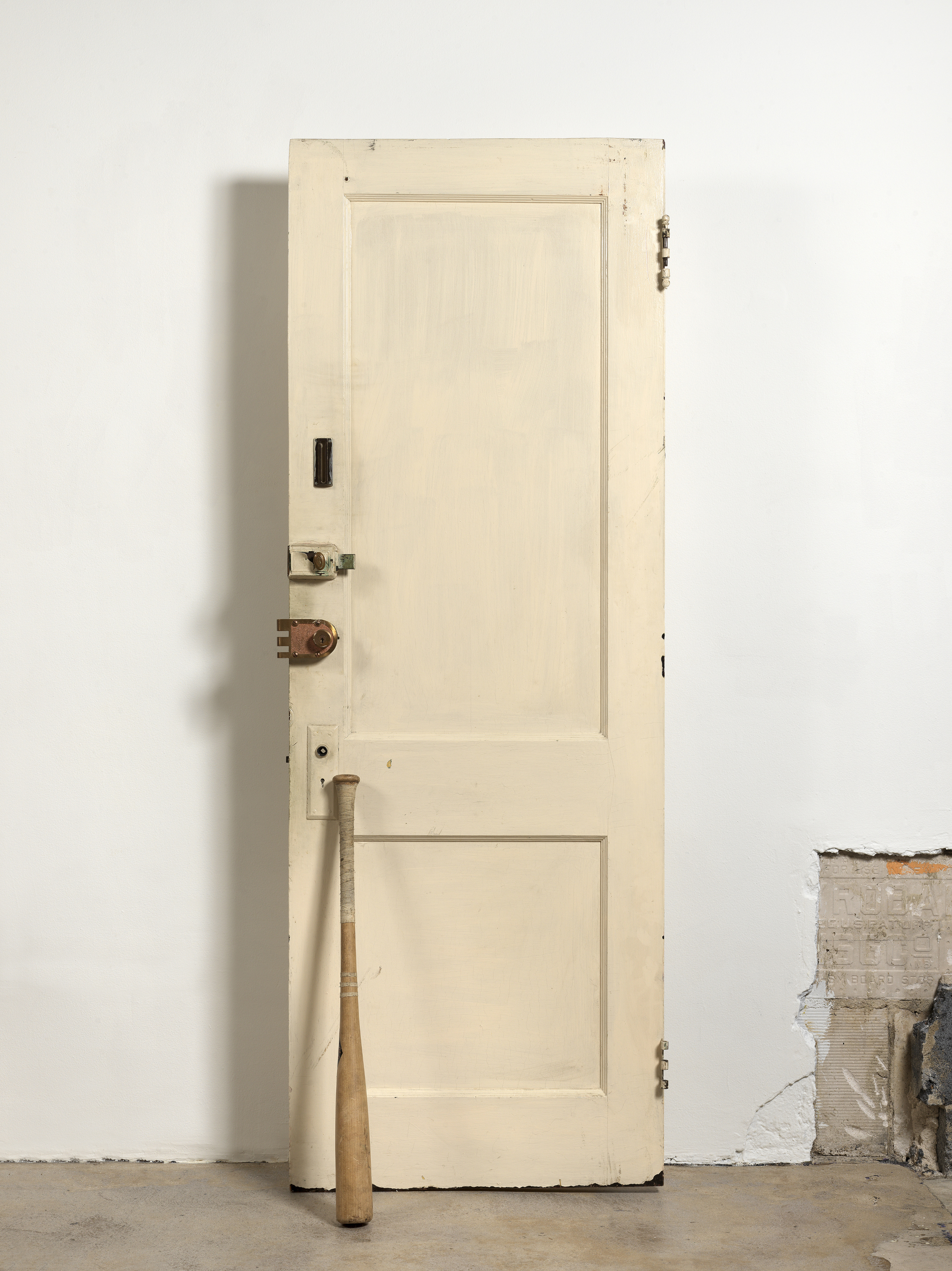Diamond Stingily, Entryways, 2016. Door with locks, bat, 79 x 25 in (200.7 x 63.5 cm). Collection Dr. Gerardo Capo. Courtesy the artist and Queer Thoughts, New York.